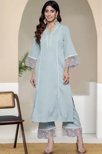 Women Solid Kurta with Trousers