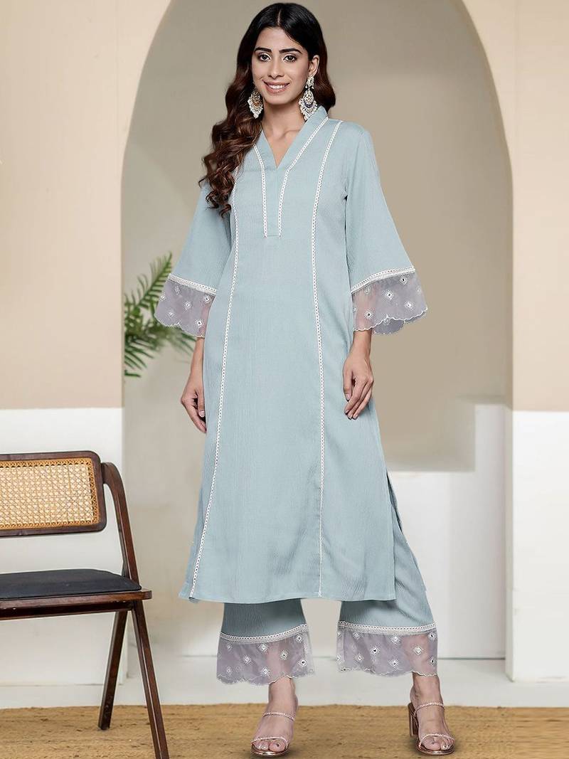 Women Solid Kurta with Trousers