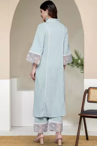 Women Solid Kurta with Trousers