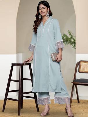 Women Solid Kurta with Trousers 4