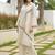 Off-White Kurta And Palazzo Set Featuring Textured Checks And Contemporary Abstract Embroidery