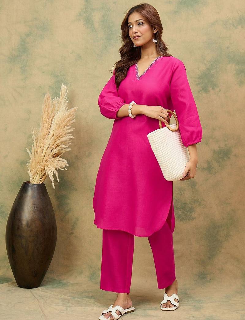 Women Solid Kurta with Trousers