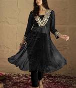 Abstract Printed Panelled Square Neck Georgette Straight Kurta With Trousers