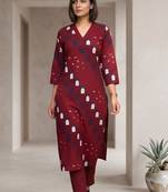 Women Printed Regular Kurta with Trousers
