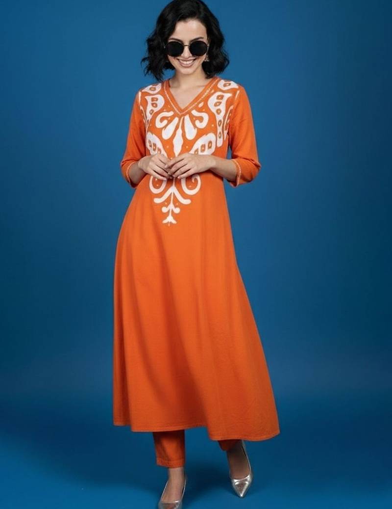 Women Embroidered Regular Kurta with Trousers