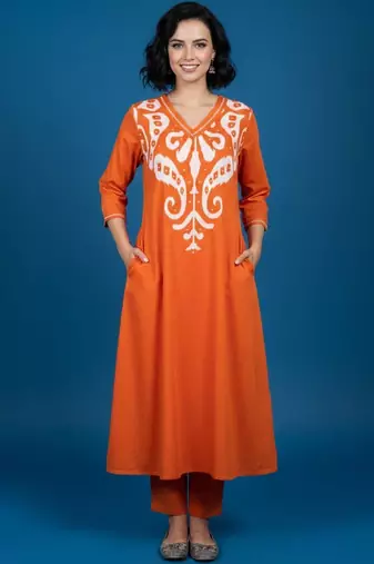 Women Embroidered Regular Kurta with Trousers