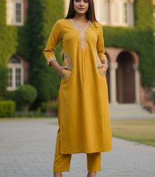 Women Ethnic Motifs Embroidered Regular Thread Work Kurta with Trousers