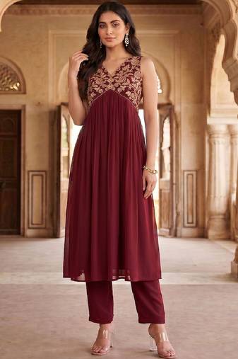 Women Ethnic Motifs Embroidered Empire Thread Work Kurta with Trousers