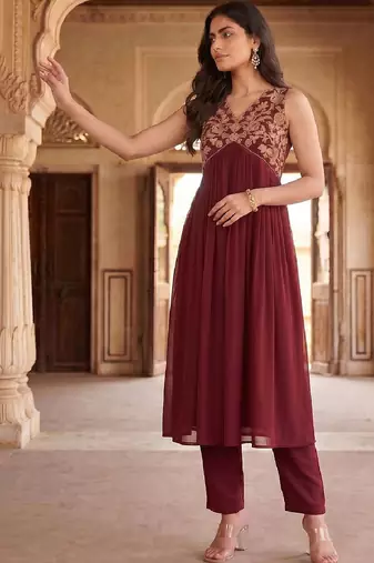 Women Ethnic Motifs Embroidered Empire Thread Work Kurta with Trousers