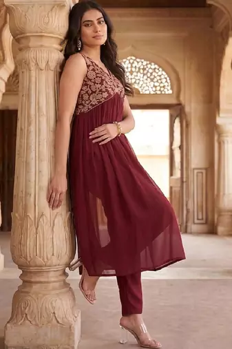 Women Ethnic Motifs Embroidered Empire Thread Work Kurta with Trousers