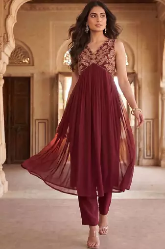 Women Ethnic Motifs Embroidered Empire Thread Work Kurta with Trousers