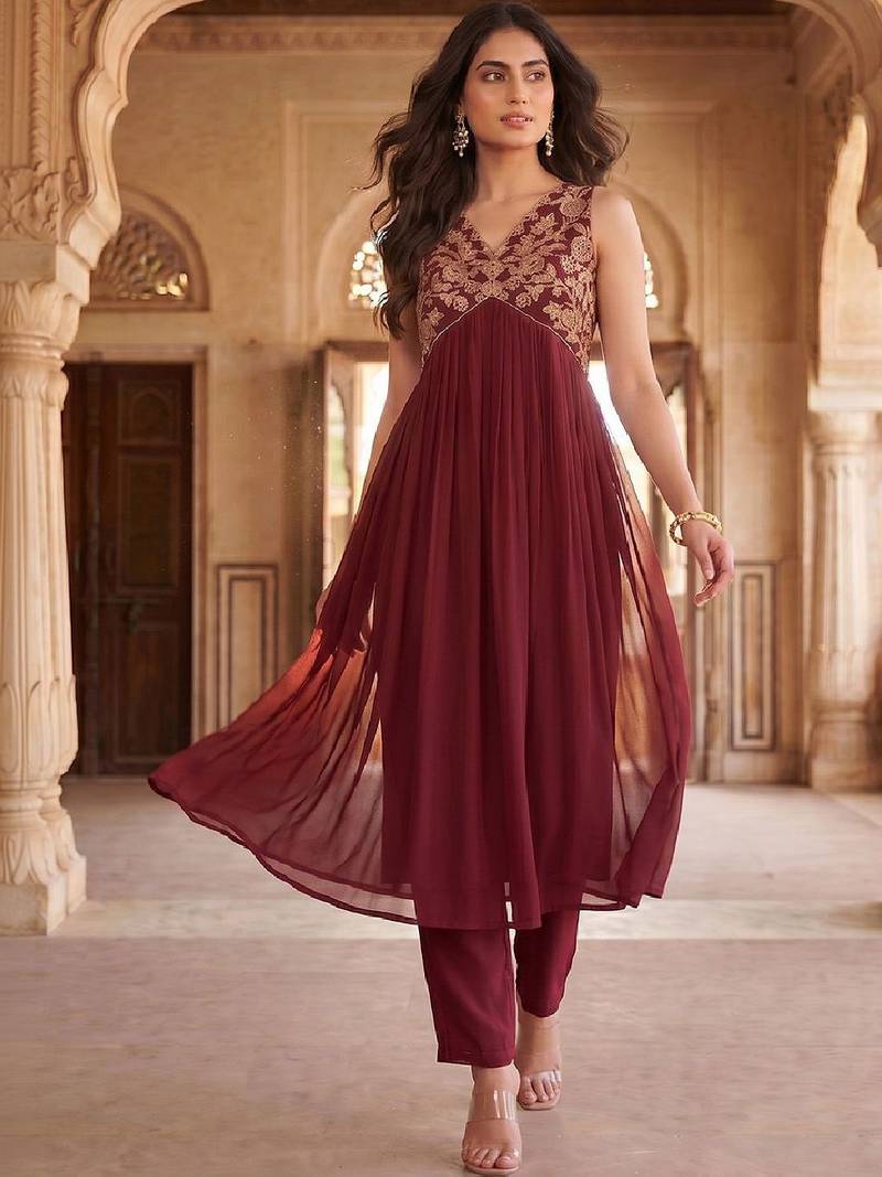 Women Ethnic Motifs Embroidered Empire Thread Work Kurta with Trousers