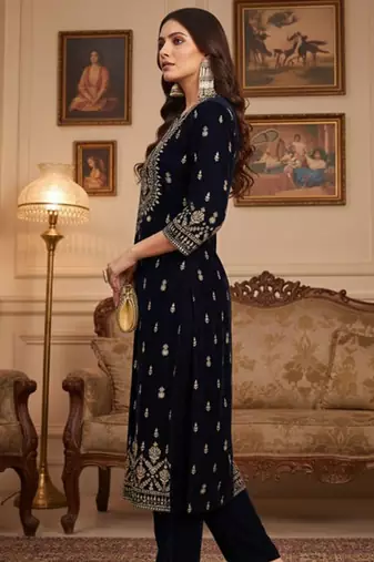 Women Ethnic Motifs Embroidered Regular Thread Work Velvet Kurta with Trousers
