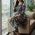 Women Printed Regular Kurta with Trousers
