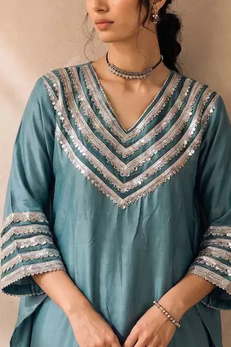Women Ethnic Motifs Embroidered Regular Thread Work Kurta with Trousers