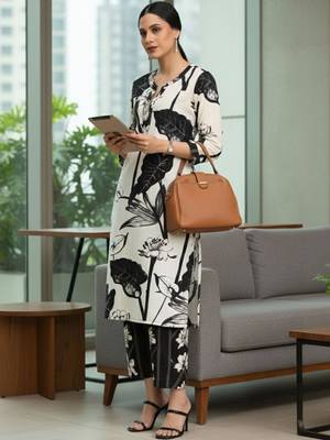 Women Floral Printed Regular Pure Cotton Kurta with Trousers 1