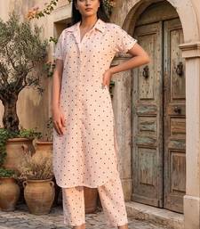 Women Printed Regular Kurta with Trousers