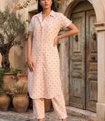 Women Printed Regular Kurta with Trousers