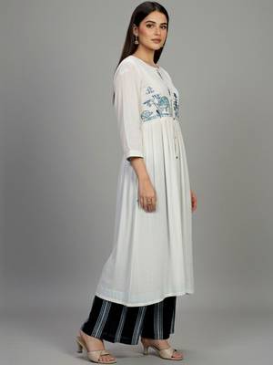 Cotton Thread Embroidered A Line Solid Kurta With Printed Palazzos 6