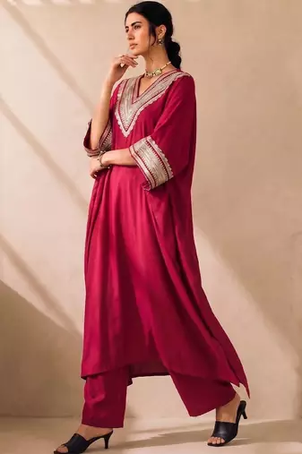 Women Embroidered Regular Kurta with Trousers