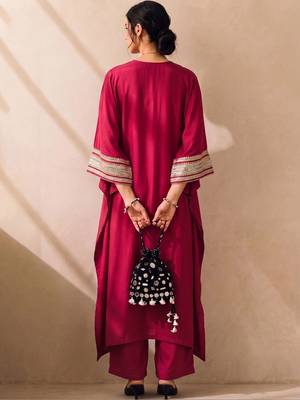 Women Embroidered Regular Kurta with Trousers 6