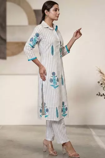 Women Printed Regular Kurta with Trousers
