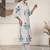 Women Printed Regular Kurta with Trousers