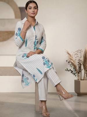 Women Printed Regular Kurta with Trousers 7