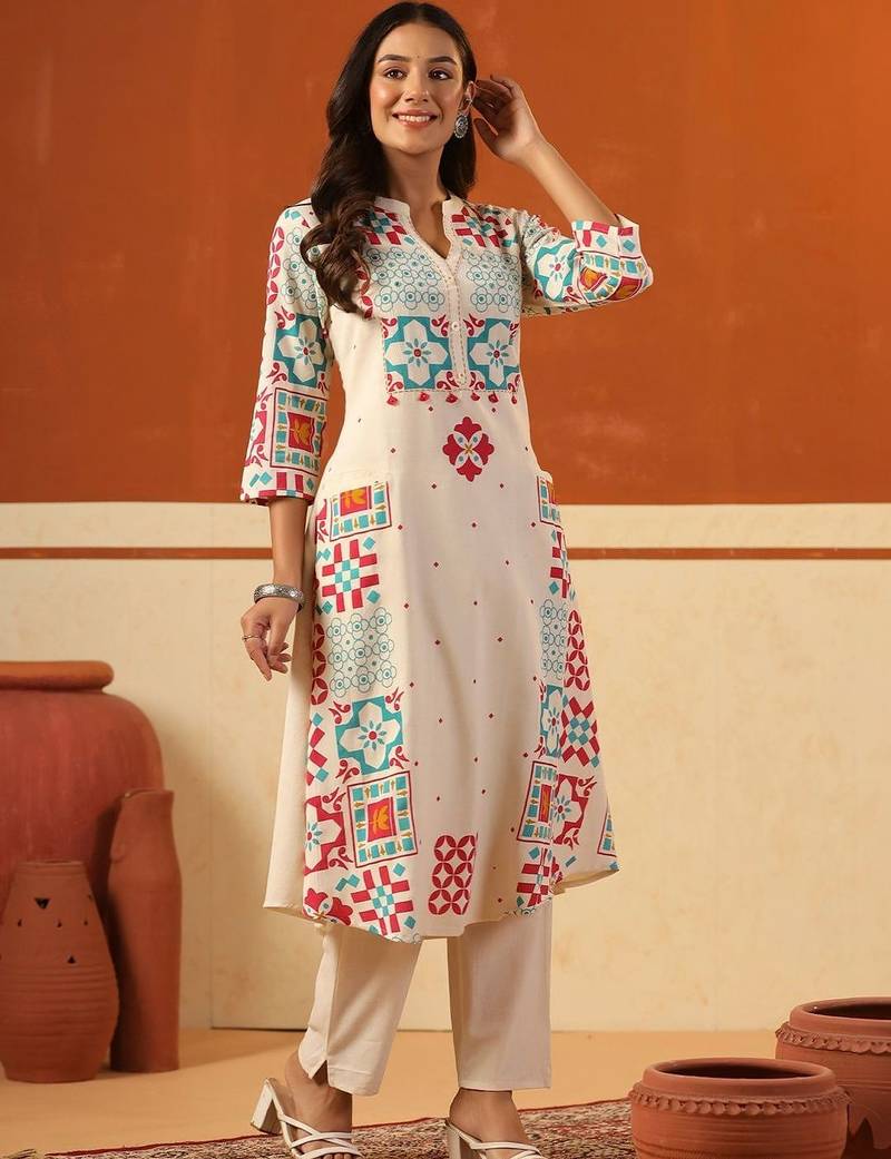 Women Printed Regular Thread Work Kurta with Trousers