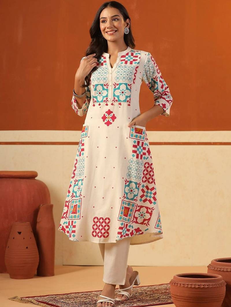 Women Printed Regular Thread Work Kurta with Trousers