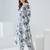 Women Floral Printed Regular  Cotton Kurta with Trousers