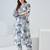 Women Floral Printed Regular  Cotton Kurta with Trousers
