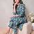 Women Printed Regular Kurta with Trousers