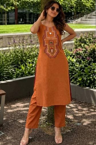 Women Embroidered Regular Mirror Work Kurta with Trousers