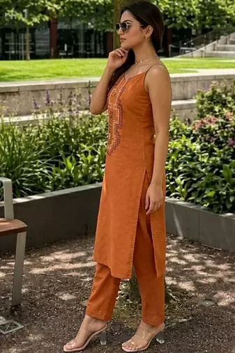 Women Embroidered Regular Mirror Work Kurta with Trousers