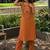 Women Embroidered Regular Mirror Work Kurta with Trousers