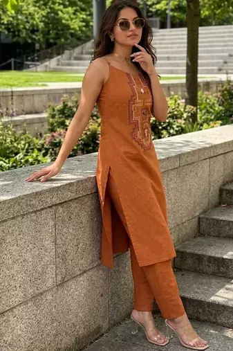 Women Embroidered Regular Mirror Work Kurta with Trousers