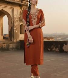 Women Ethnic Motifs Embroidered Regular Thread Work Kurta with Trousers