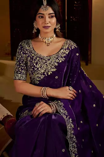 Purple satin jimmy choo embroidered embellished havy work wedding wear saree