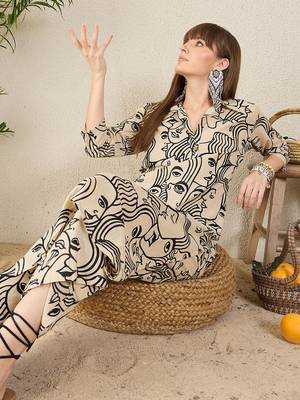 Women Abstract Printed Cotton Kurta with Palazzos 6