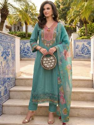 women floral embroidered regular thread work  cotton kurta with trousers & with dupatta 1