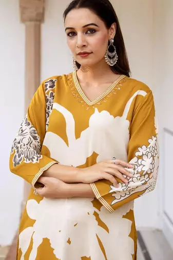 Women Floral Printed Regular Sequinned Kurta with Salwar
