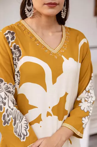 Women Floral Printed Regular Sequinned Kurta with Salwar