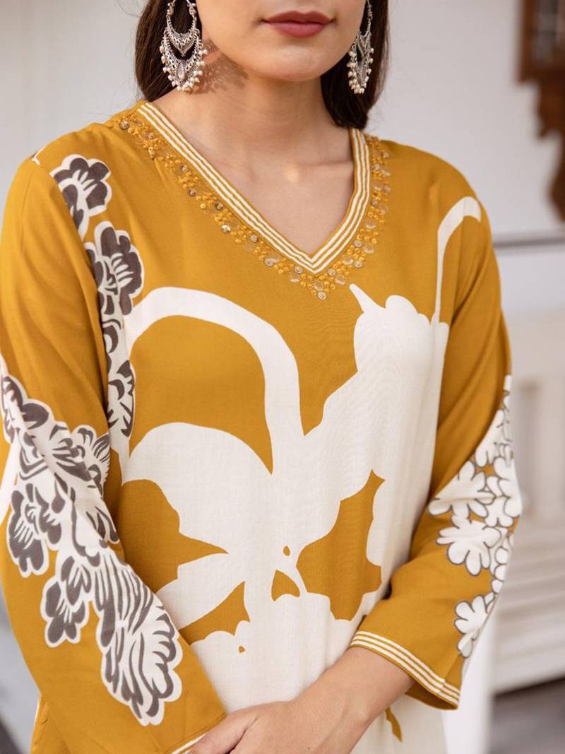 Women Floral Printed Regular Sequinned Kurta with Salwar