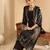 Women Printed Regular Kurta with Trousers