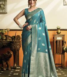Teal blue silk blend saree with zari weaving & leaf motifs