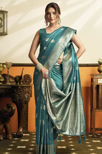 Teal blue silk blend saree with zari weaving & leaf motifs
