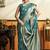 Teal blue silk blend saree with zari weaving & leaf motifs