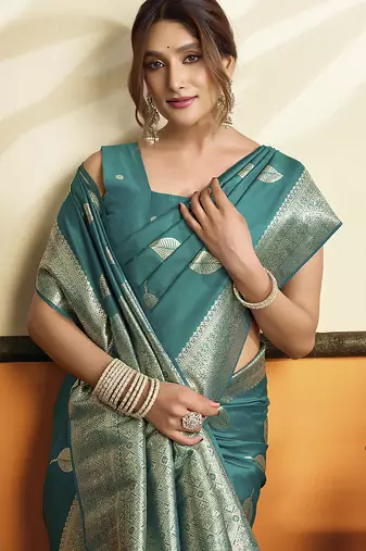 Teal blue silk blend saree with zari weaving & leaf motifs