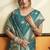 Teal blue silk blend saree with zari weaving & leaf motifs